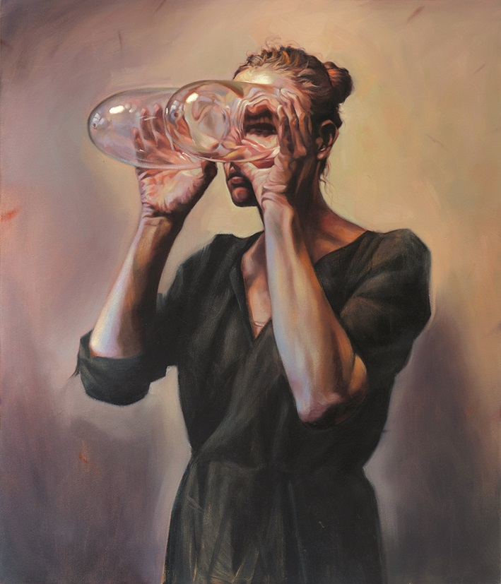 Woman in a dark dress holding two glasses in front of her face and looking through them. Soft, abstract colors in the background.