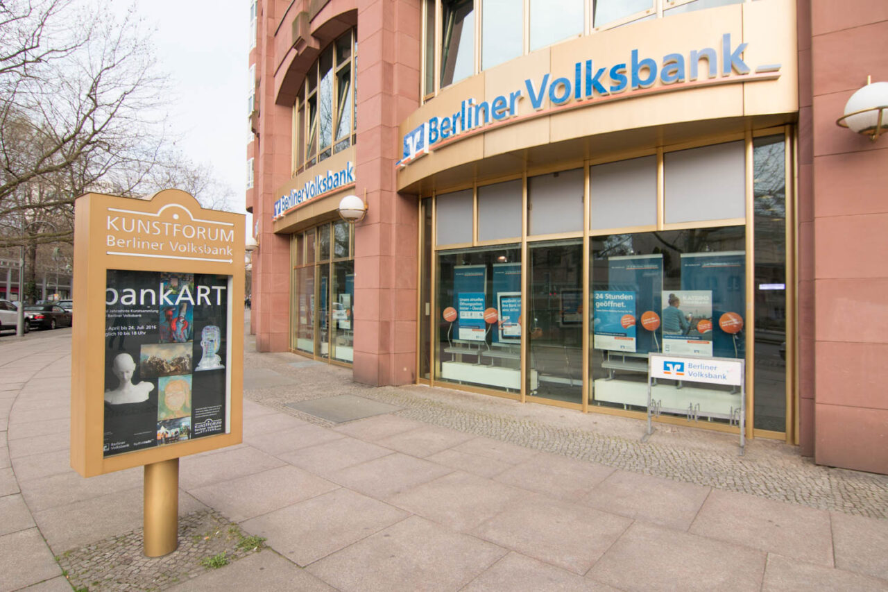 Entrance to Berliner Volksbank with art forum advertisement for the "bankART" exhibition.