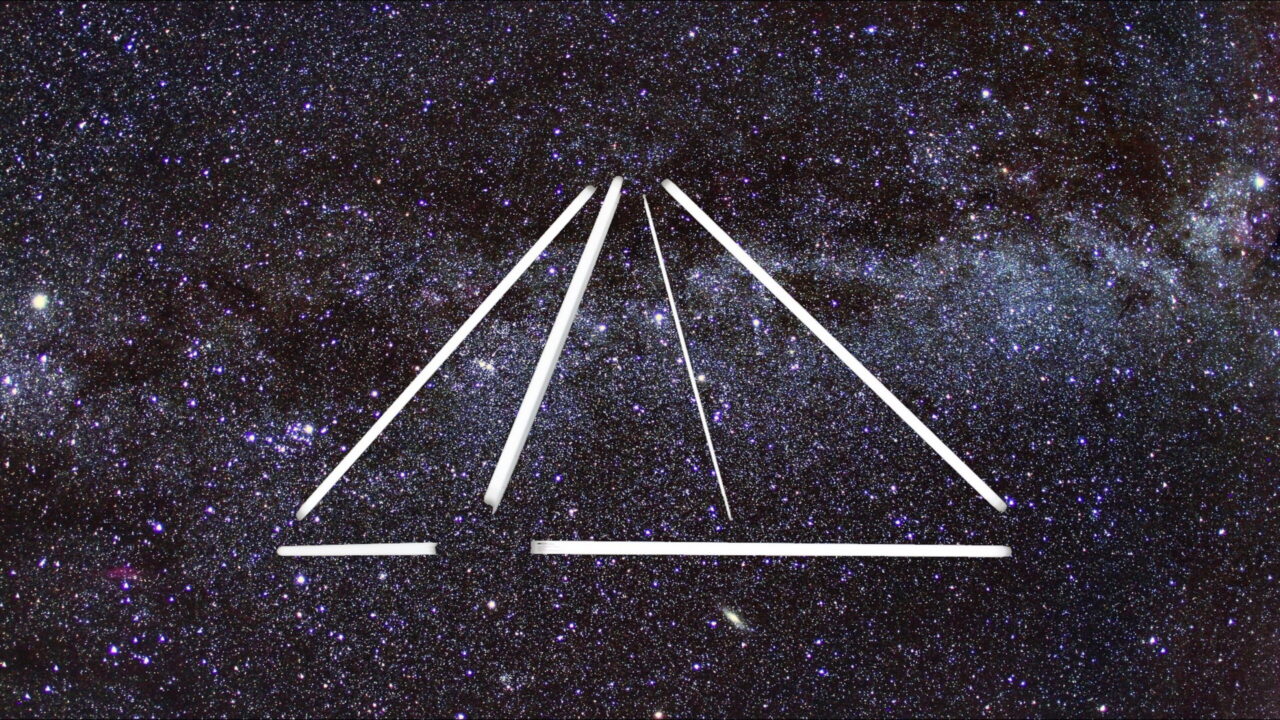 Dark night sky filled with numerous stars and distinct white lines forming a pyramid-like shape.