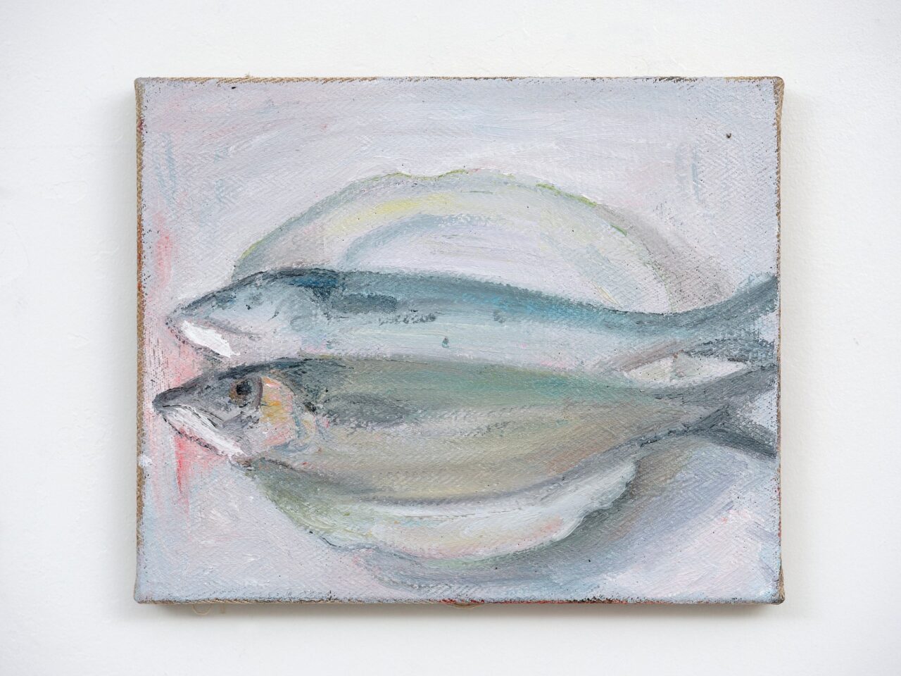 Two painted fish on a plate, surrounded by soft, bright colors and gentle brush strokes.